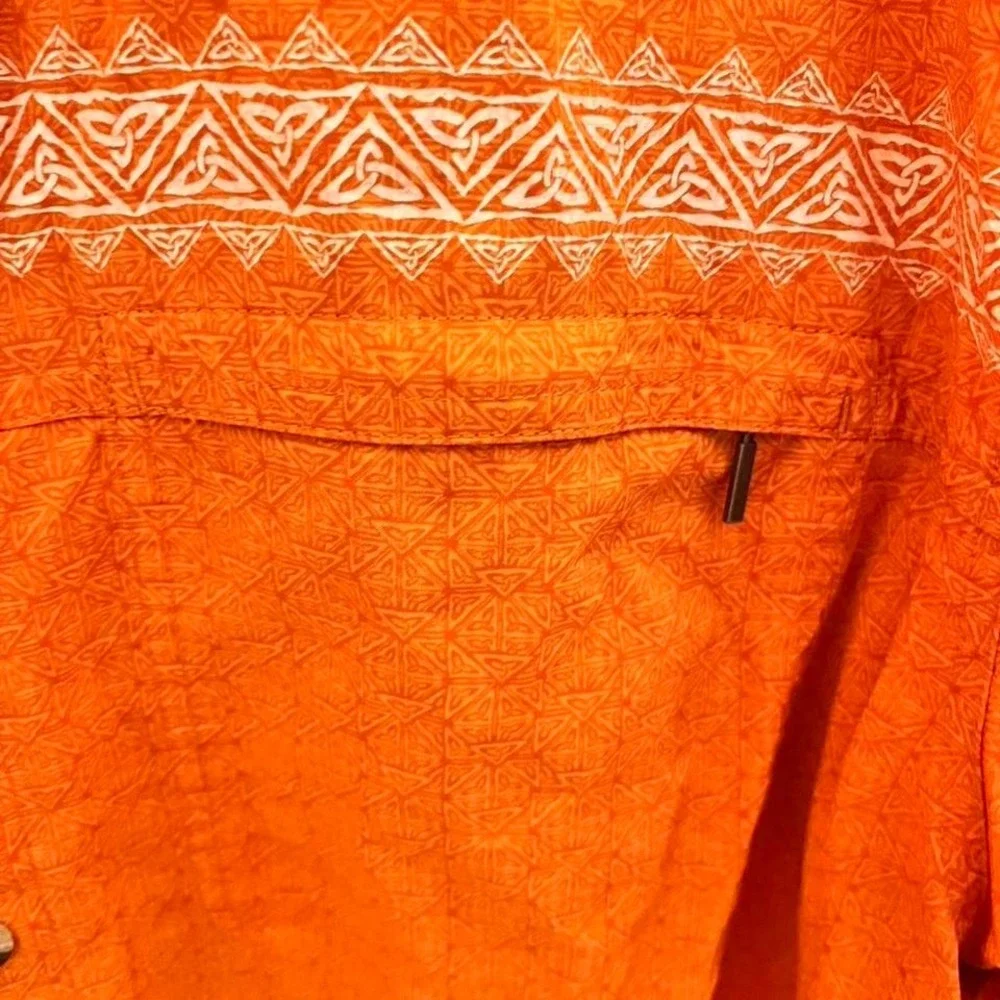 The North Face Orange button-up shirt with a boho vibe‎